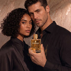 Couple holding a RHAMA Bold Lavender Vanille 50 ml perfume bottle