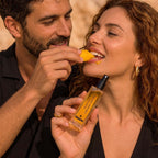 Rhama Mango Cream Crush 8ml perfume bottle shown in a lifestyle scene